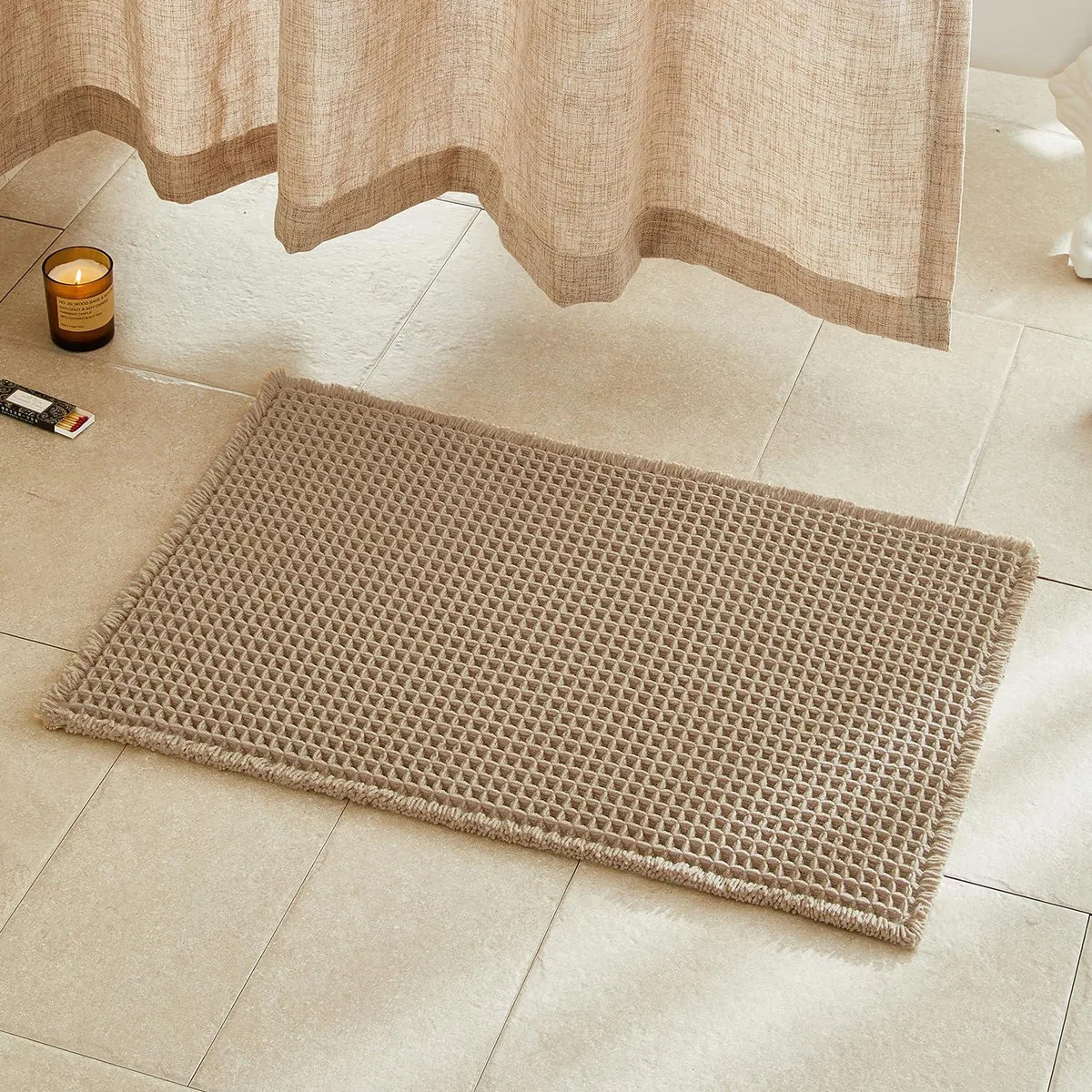 Khaki rectangular waffle-texture polyester bath mat, 30 by 20 inches