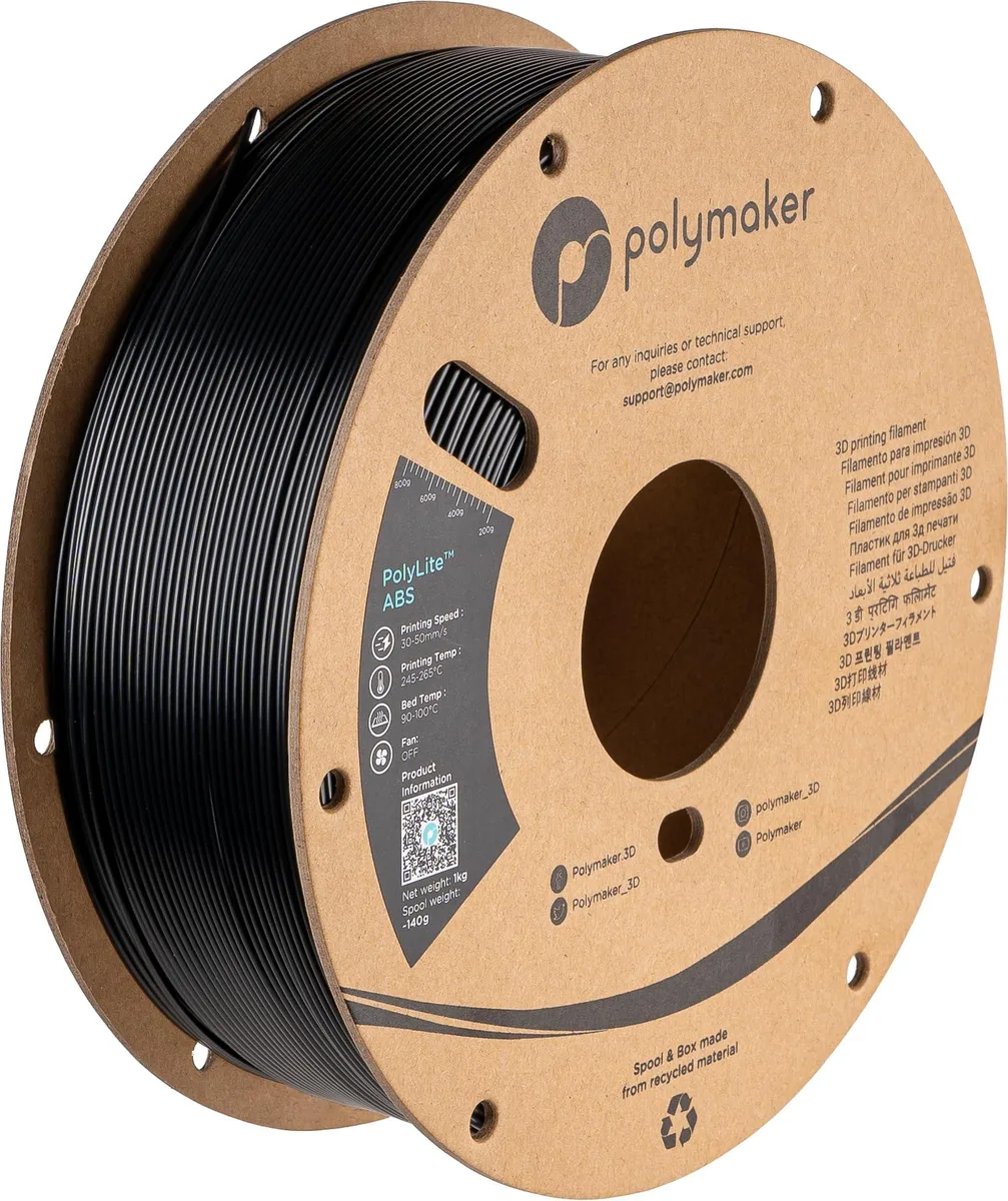 Black 1.75mm ABS filament spool in vacuum-sealed bag with desiccant, cardboard spool visible