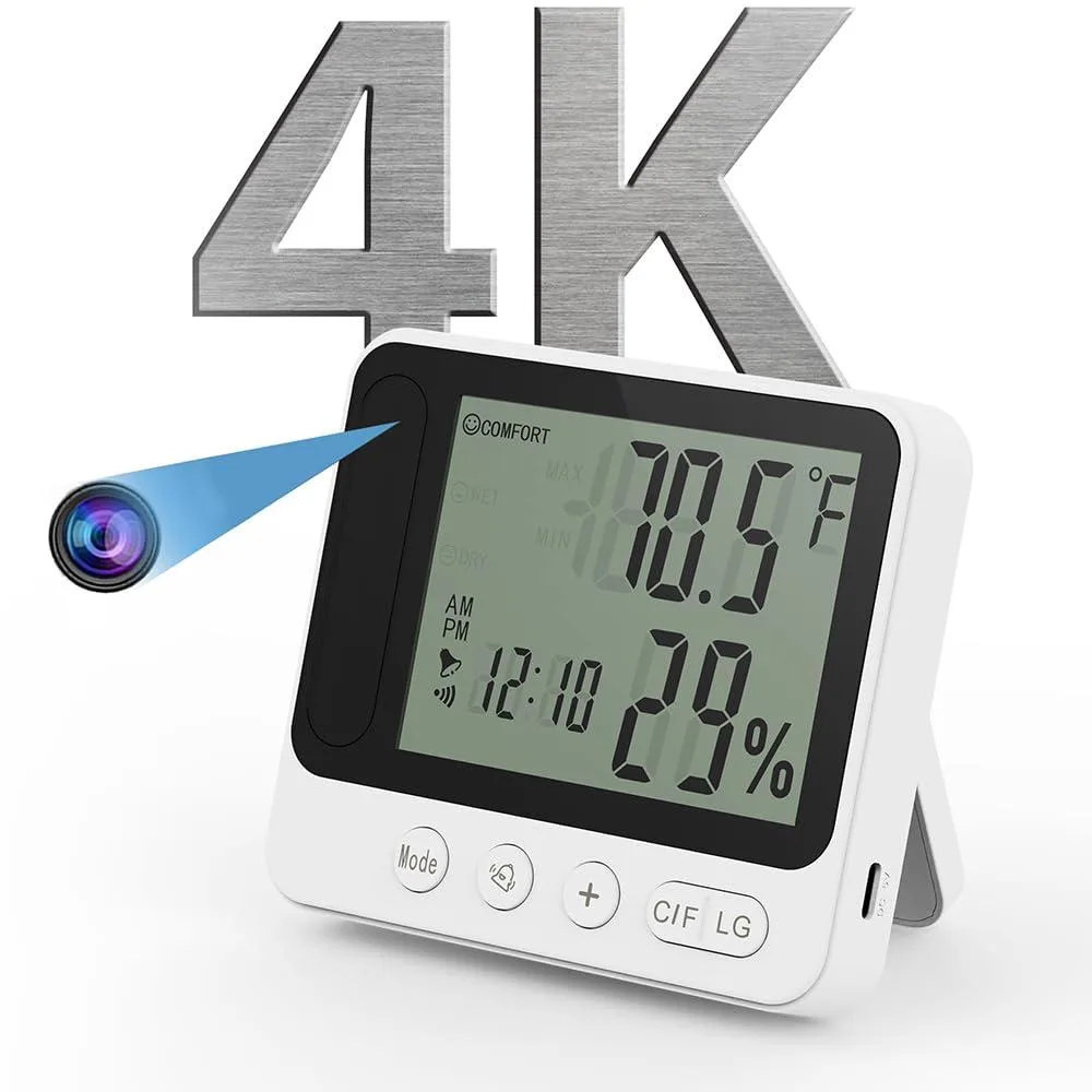 A compact alarm clock with a hidden 1440p camera lens, matte finish