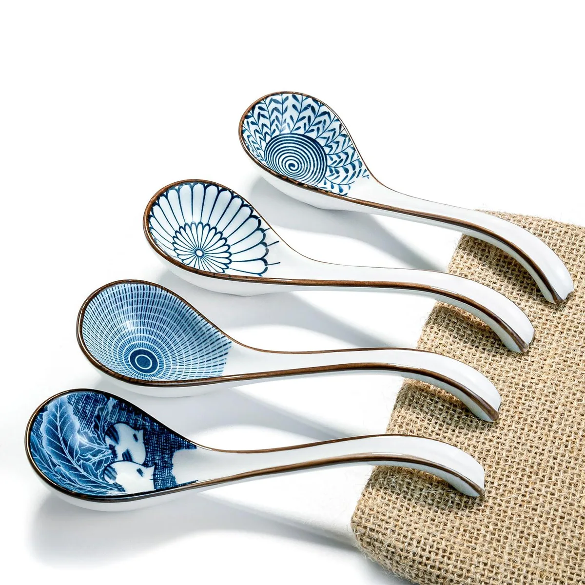 White ceramic Asian soup spoons with long curved handles, set of 24