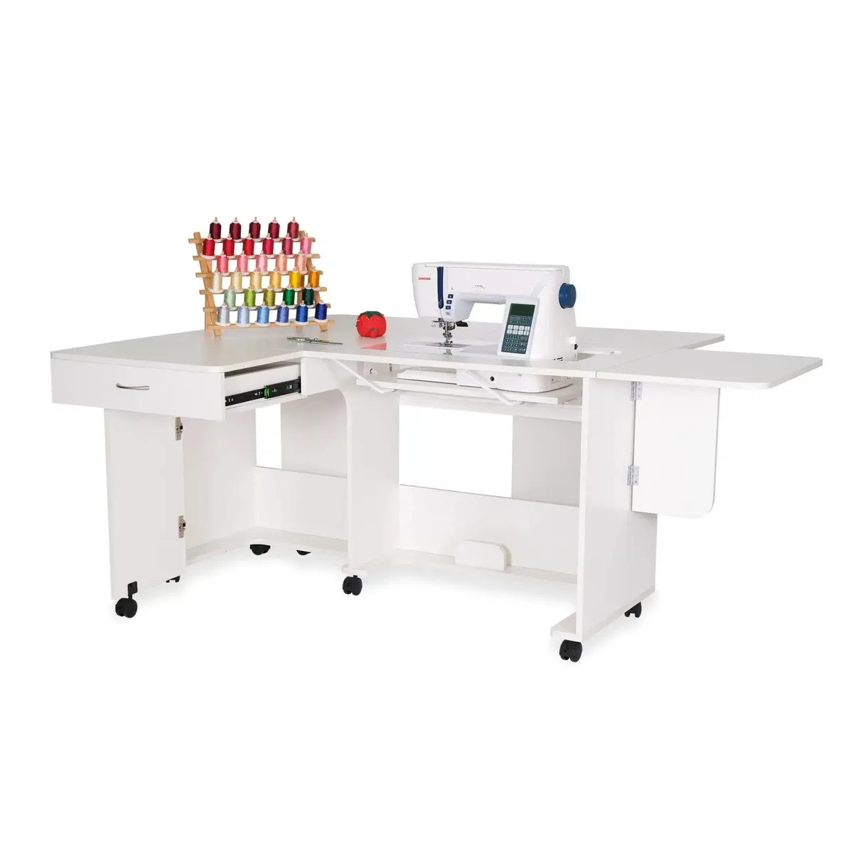 White sewing cabinet with manual lift, expandable leaves, storage drawer and locking casters