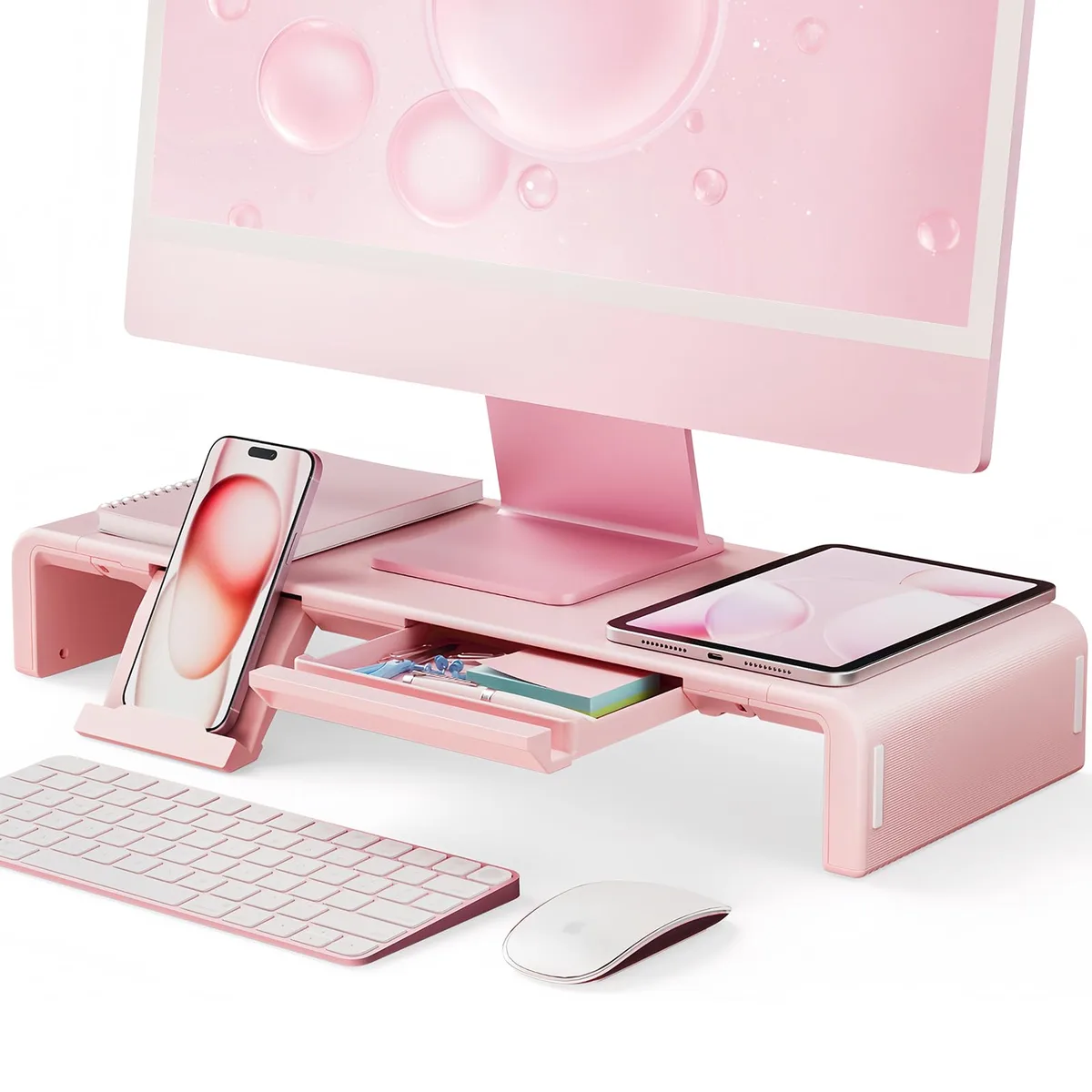 Pink foldable monitor stand with storage drawer and tablet holder, three adjustable widths, rubberised legs