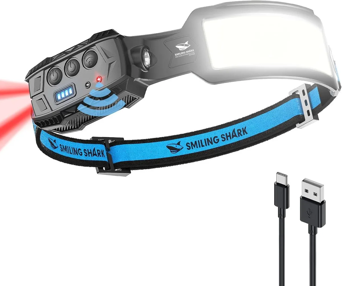 Black headlamp unit with seven white LEDs and red rear light on adjustable fabric strap
