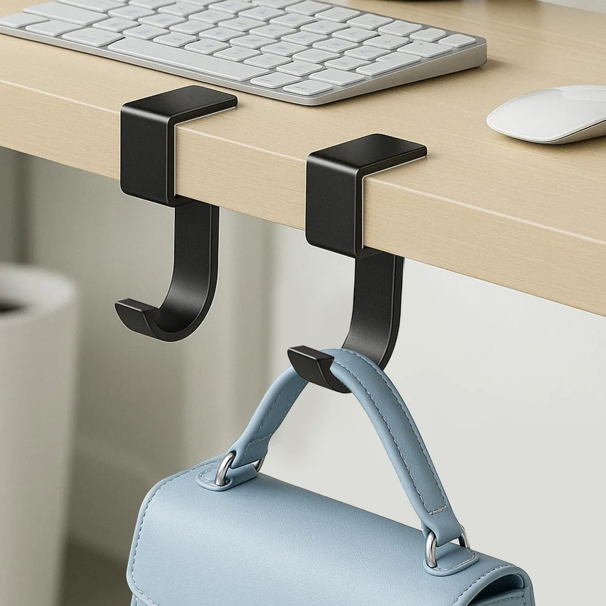 Two small alloy purse hooks with non-slip base pads