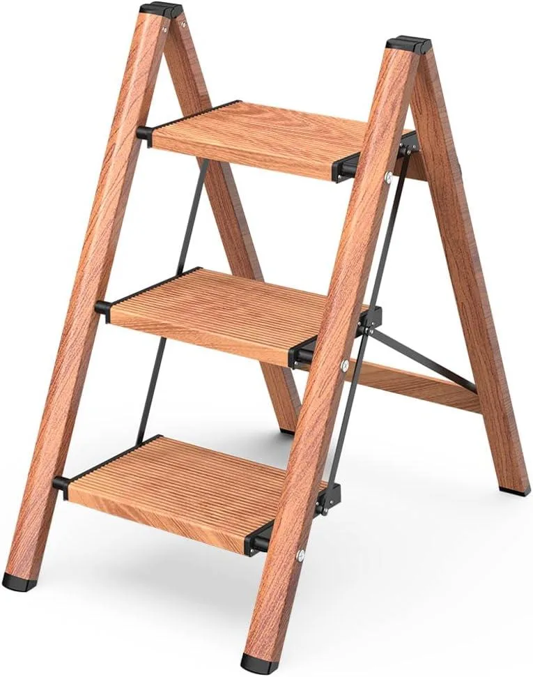 Three-step folding ladder in woodgrain finish with top handrail and wide anti-slip steps
