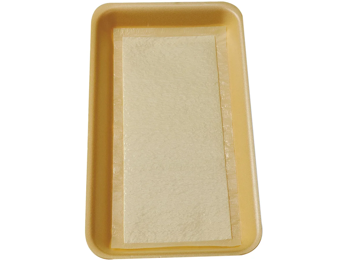 Pactiv Pactiv TA1341108 White/Yellow Butcher Tray Pads 4 1/2" x 6" 2000 Pack — tuotekuva
