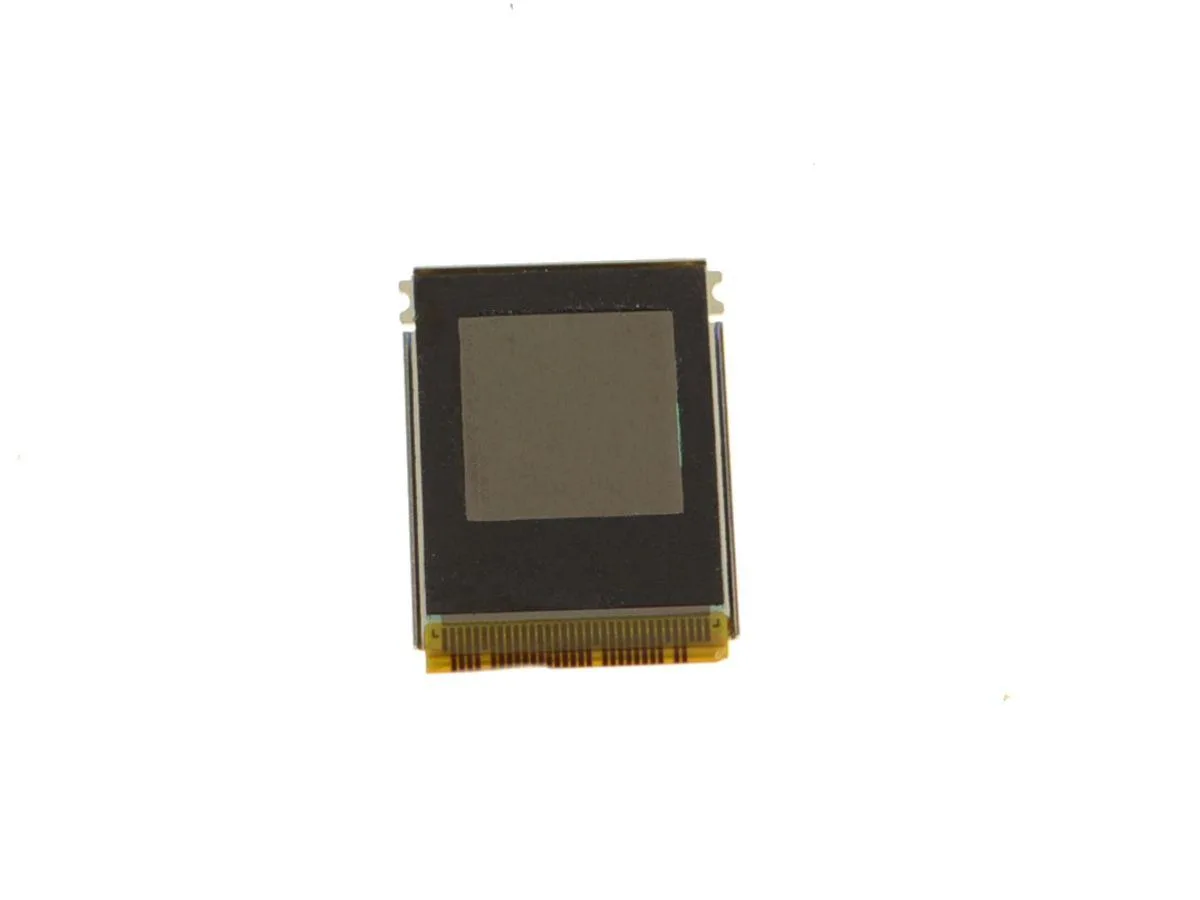 Small green circuit board with silver fingerprint sensor module and ribbon cable connector