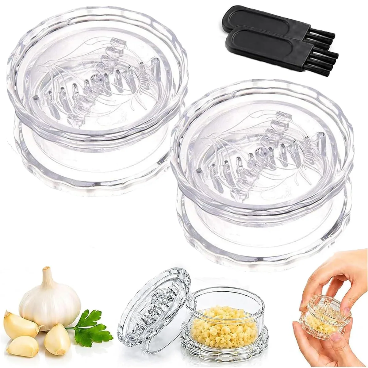 Two clear plastic garlic twisters, 81 mm wide, 41 mm high