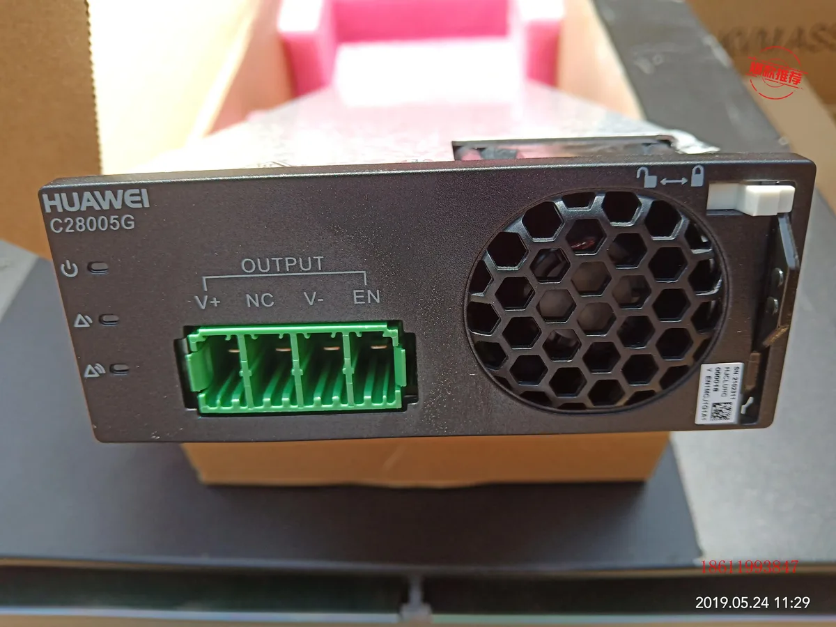 Rectangular silver server power module with front handle and ventilation slots