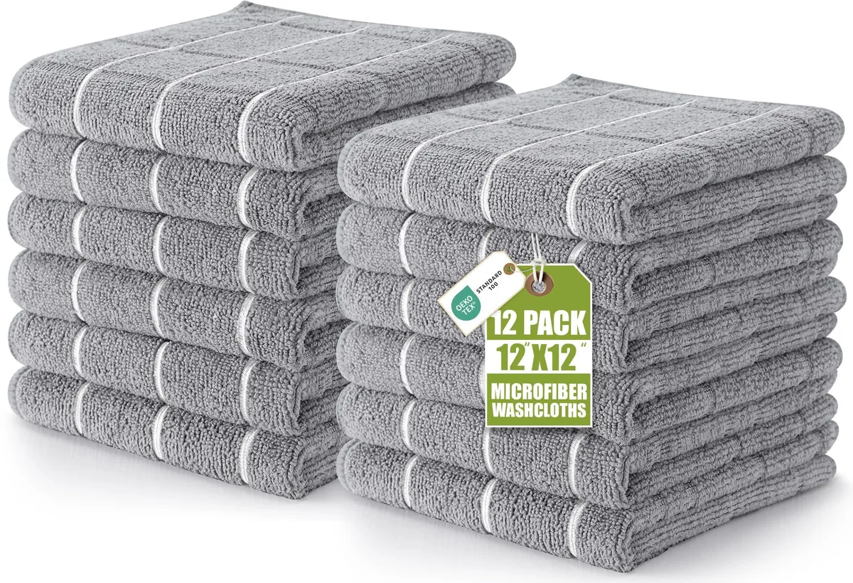 Twelve grey microfibre washcloths in a checkered pattern, each 12 inches square