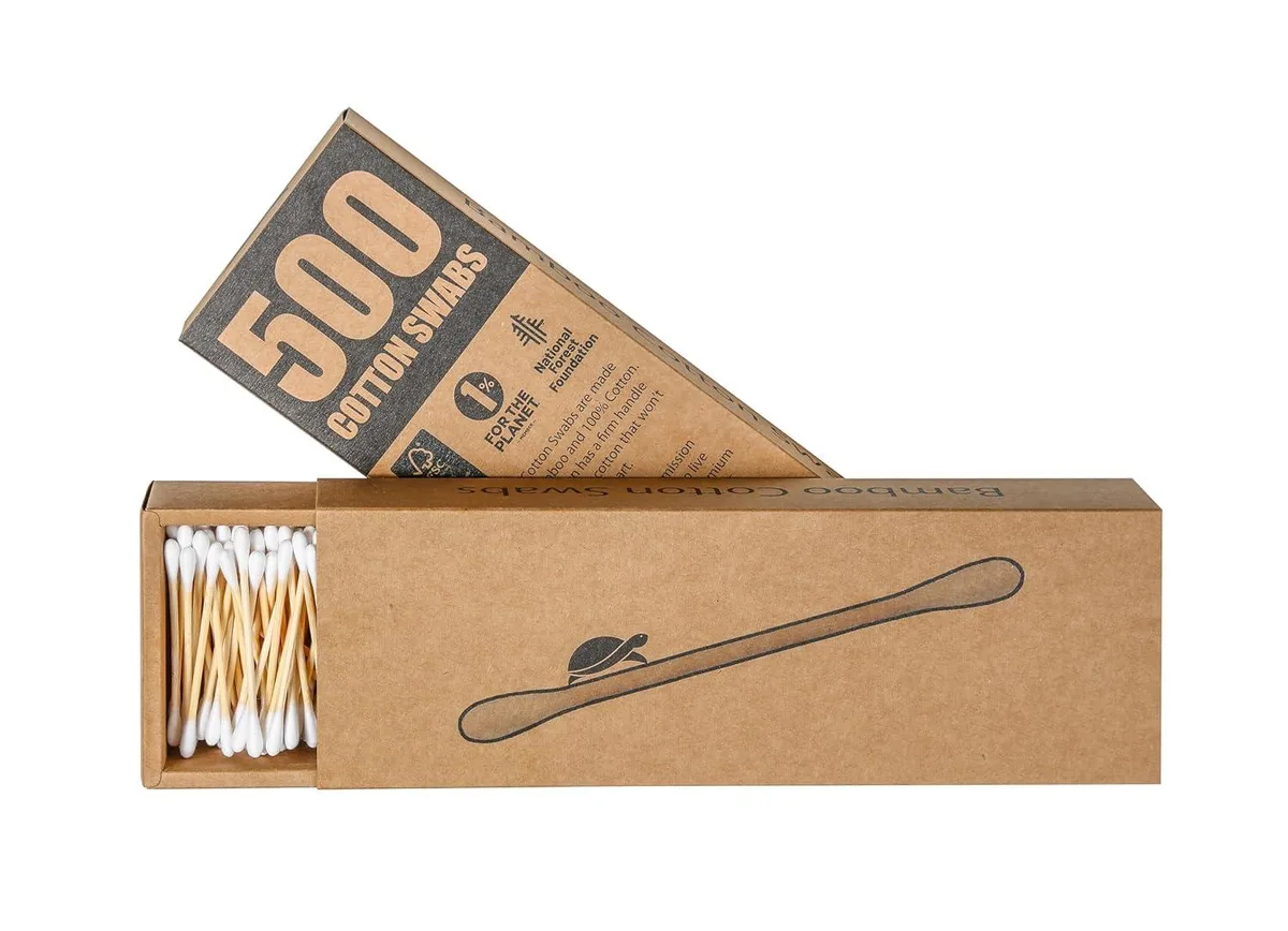A kraft box holding 500 bamboo cotton swabs with cotton tips