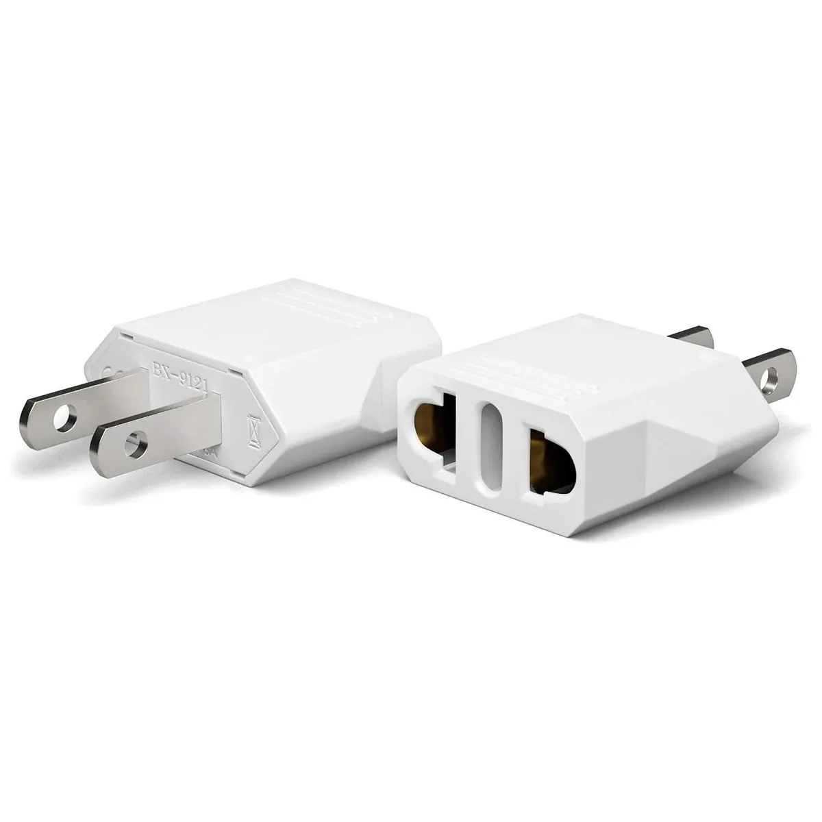 Two small white EU-to-US plug adapters with flat US pins and round EU sockets, compact rectangular shape, smooth matte finish