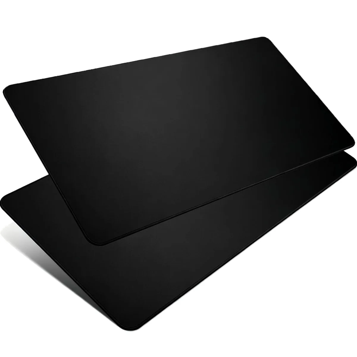 Two black rectangular desk pads with stitched edges lying flat
