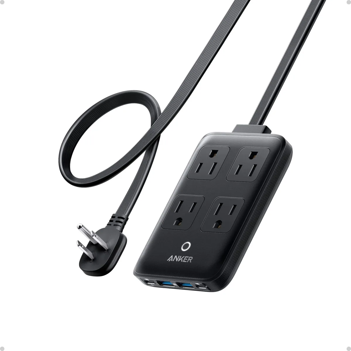 Slim white rectangular power strip with four AC outlets two USB-A and two USB-C ports .7 inch thick