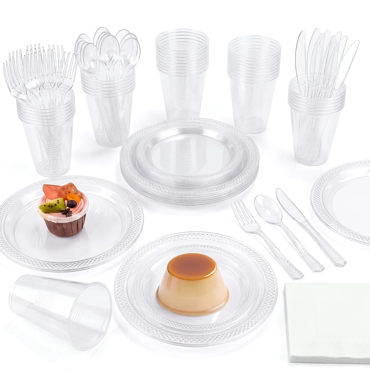 Clear disposable dinnerware set with plates cups cutlery and napkins in boxed packaging