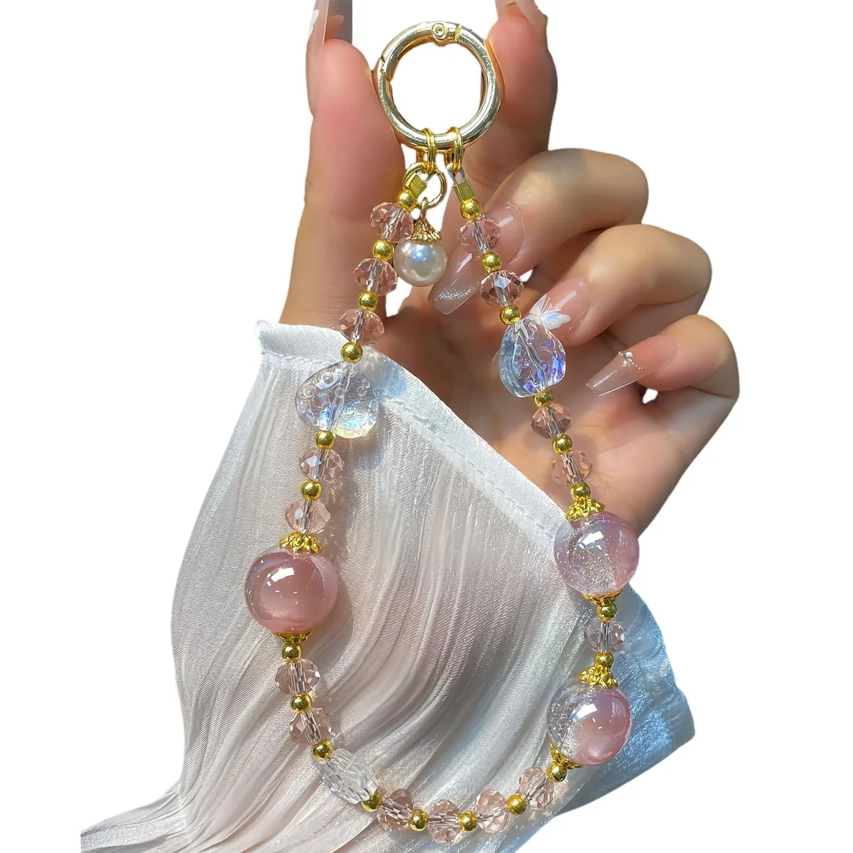  LIFCIUSO Sparkling Pink Phone Charm Beaded Wrist Strap 360° Rotating Tab .032 kg — product photo