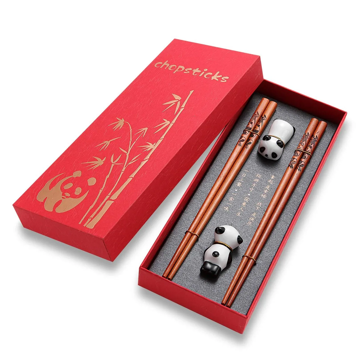 Two pairs of brown wooden chopsticks 25cm with ceramic panda rests in red gift case