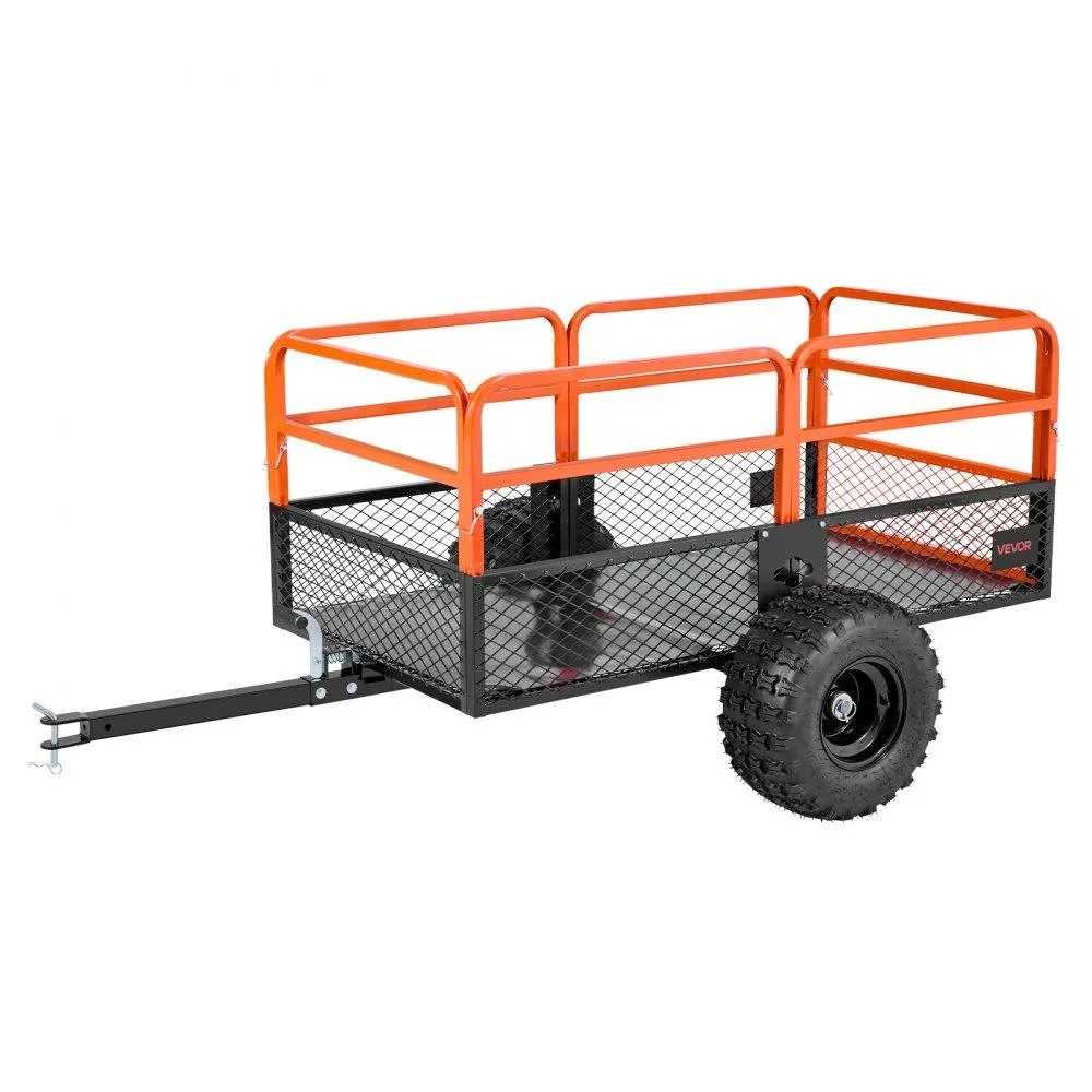 Green steel dump trailer on four pneumatic tyres, tow bar attached