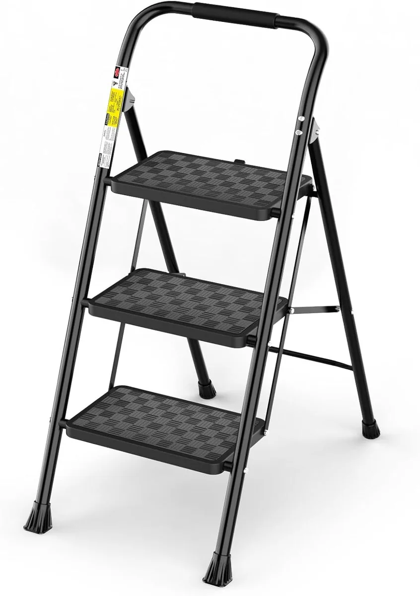 Black three-step folding steel ladder with cushioned handle and non-slip step mats
