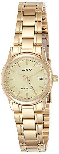 Gold Casio analogue watch on white background