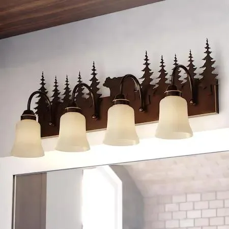 Four-light bronze vanity fixture with distressed finish and rustic bear detailing
