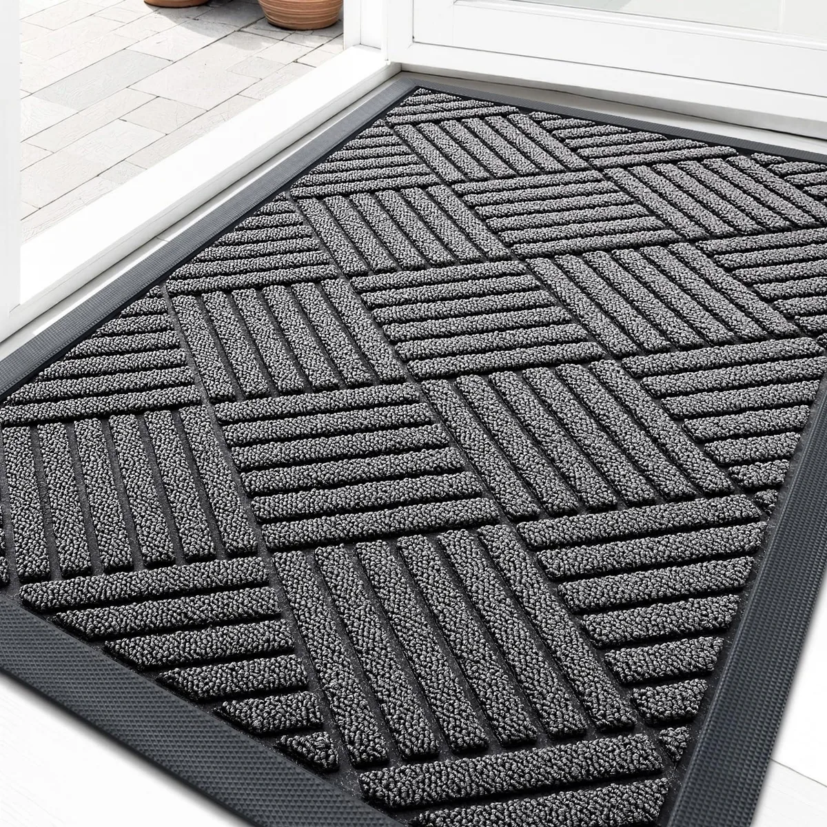 Grey diamond-pattern doormat, low-profile rubber backing, 29.5 by 17 inches