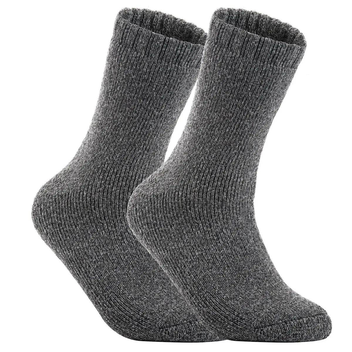Four pairs of beige wool crew socks folded together