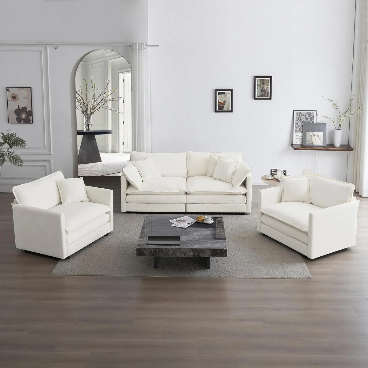Three-piece white chenille sofa set with two armchairs and a two-seat sofa