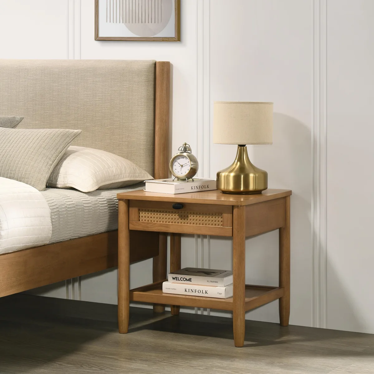 Light walnut nightstand with woven drawer front and open lower shelf