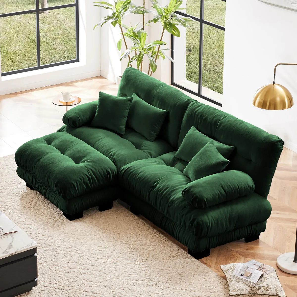 Green chenille two-seater sofa with convertible ottoman and four pillows