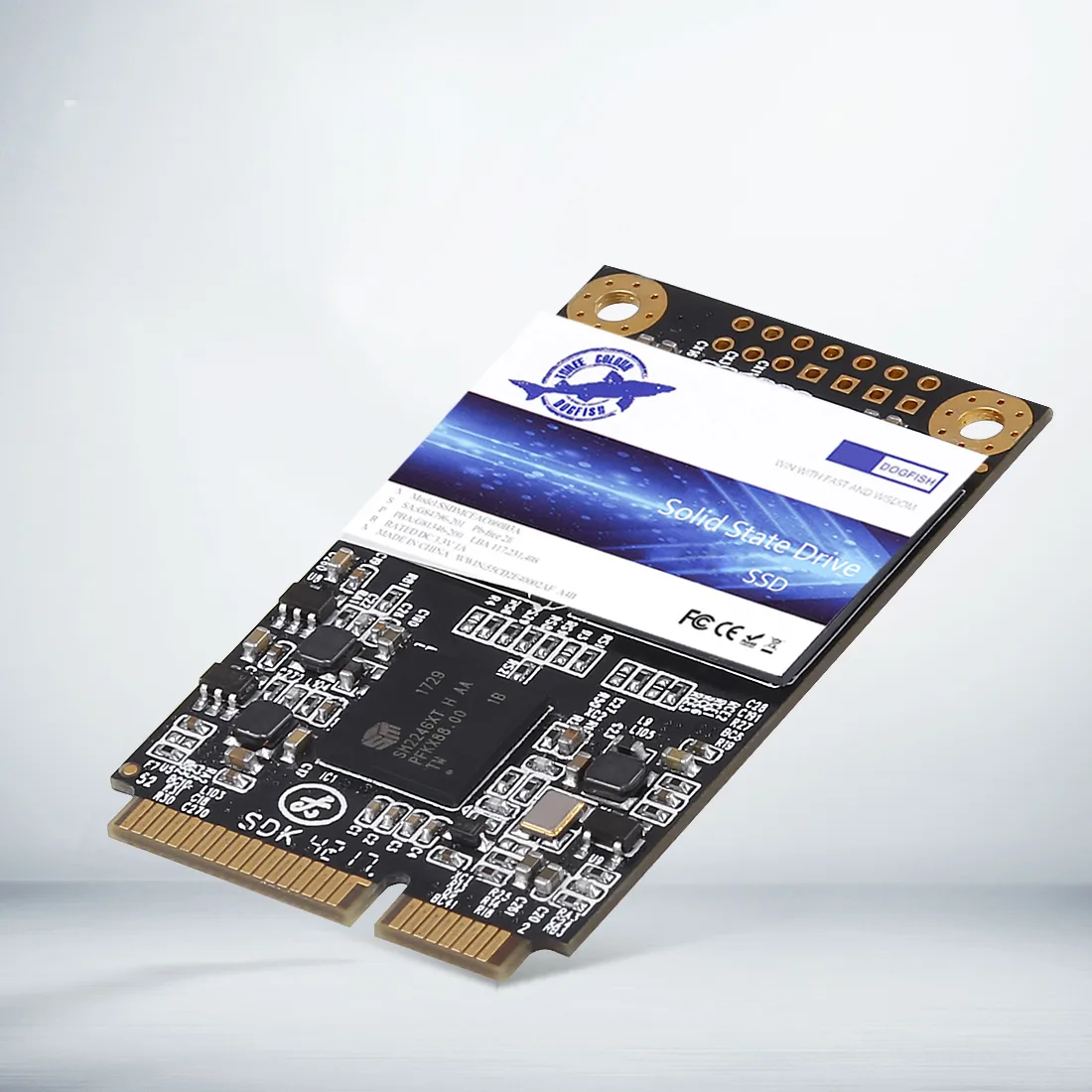 Small green circuit board mSATA SSD with gold edge connector and black label
