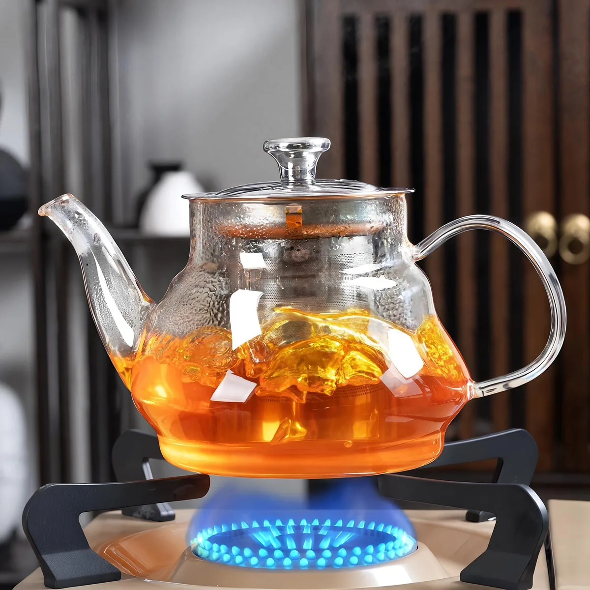 Clear glass 20 oz teapot with stainless steel infuser and lid, ergonomic handle, eagle-shaped spout