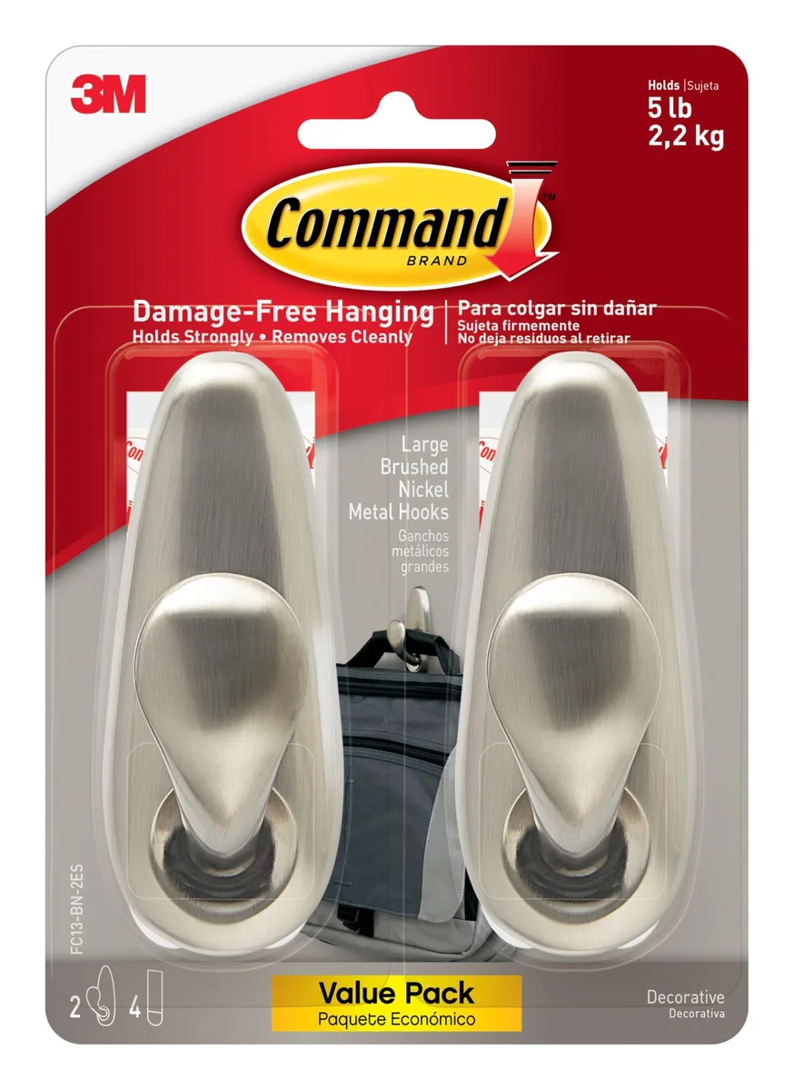 Two brushed nickel metal hooks with adhesive strips on white backing card