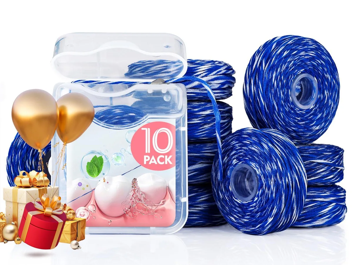 Ten mint floss spools in a clear snap-top box