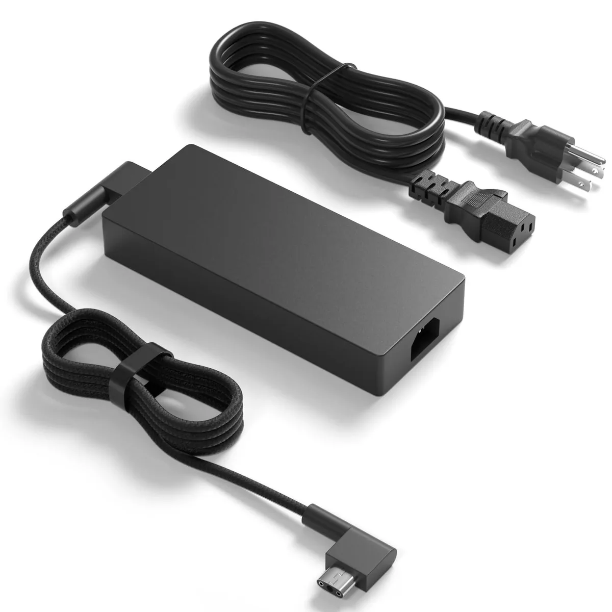 Rectangular black Dell PD65W power brick with three-round-hole connector and detachable mains cord
