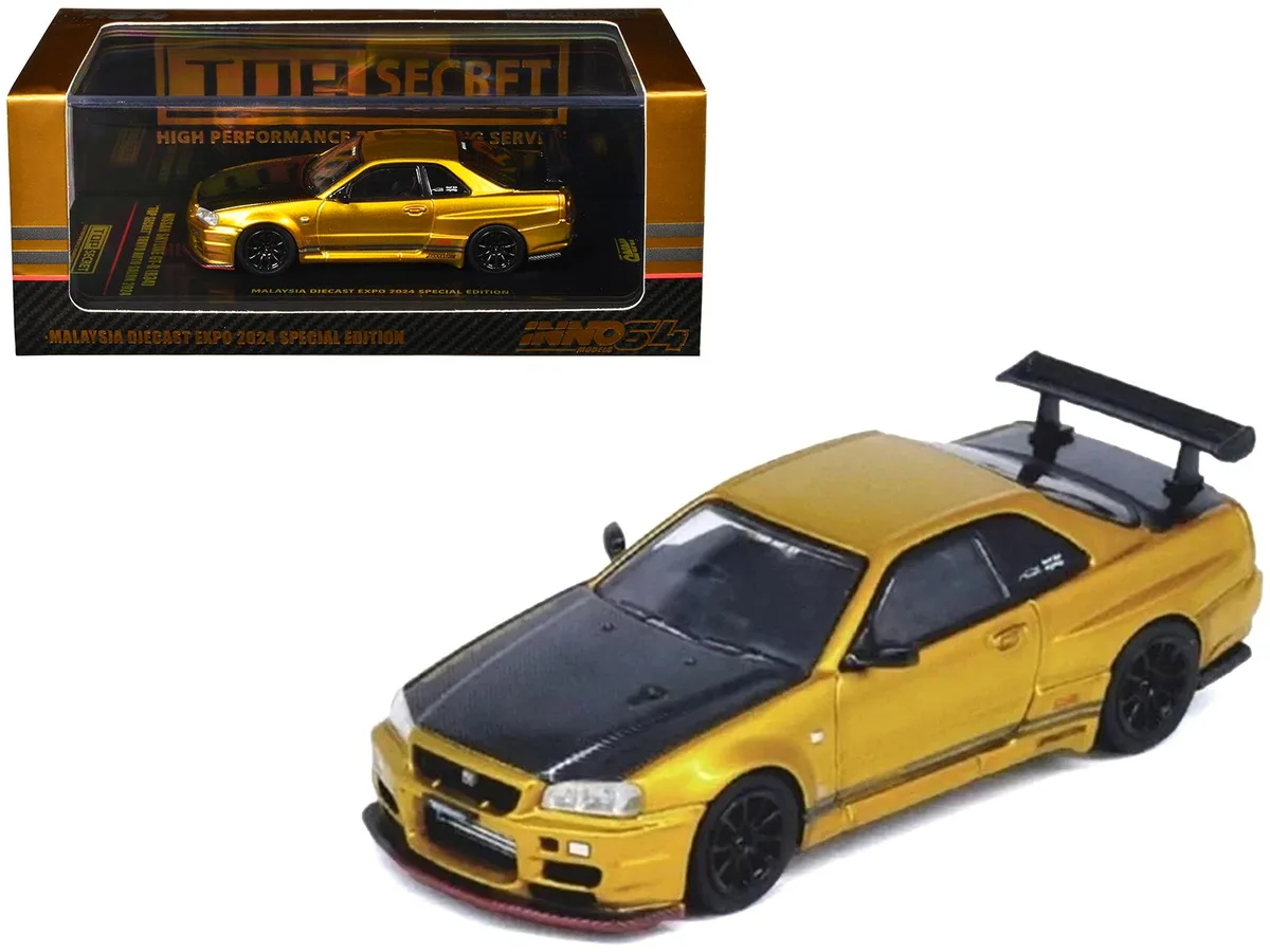 Inno Models Inno Models Nissan Skyline GT-R (R34) RHD Gold Metallic Carbon Hood Trunk 1/64 Diecast — product photo
