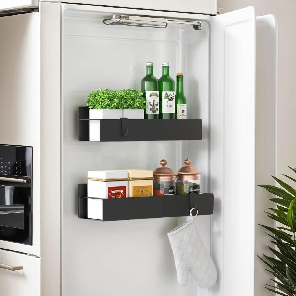 Two black metal magnetic spice racks with guardrails, rectangular shelves, matte finish