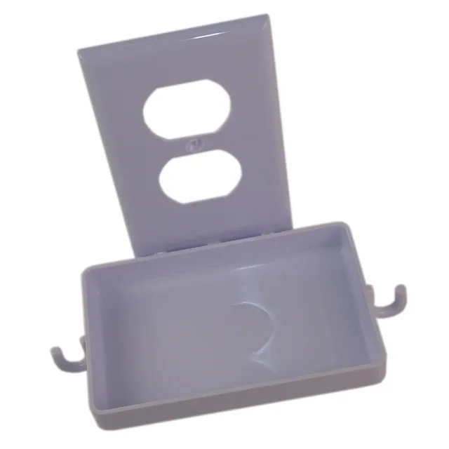 White outlet cover with integrated storage shelf