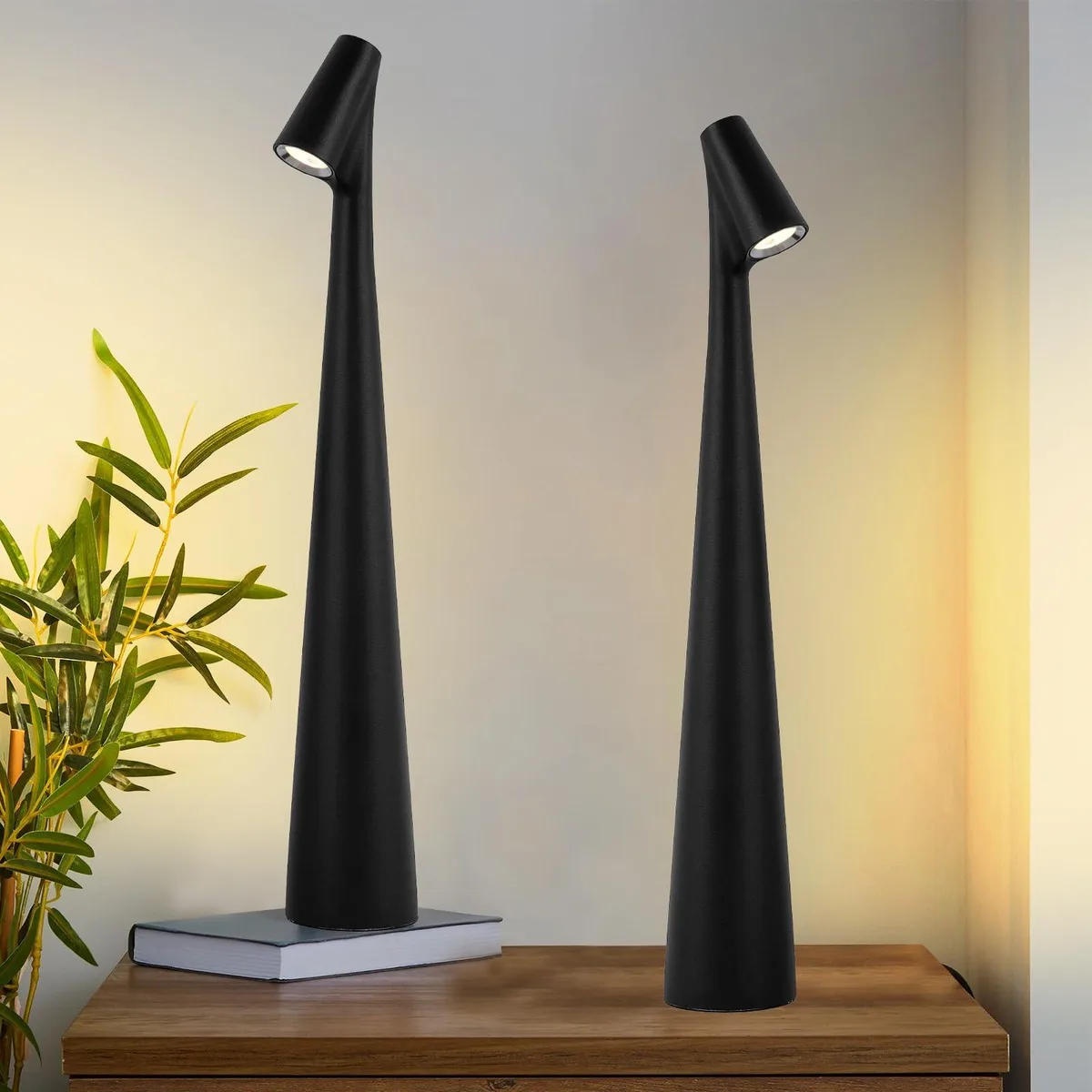 Matte black aluminum cordless table lamp, 13.5 inches tall, round shape with touch control