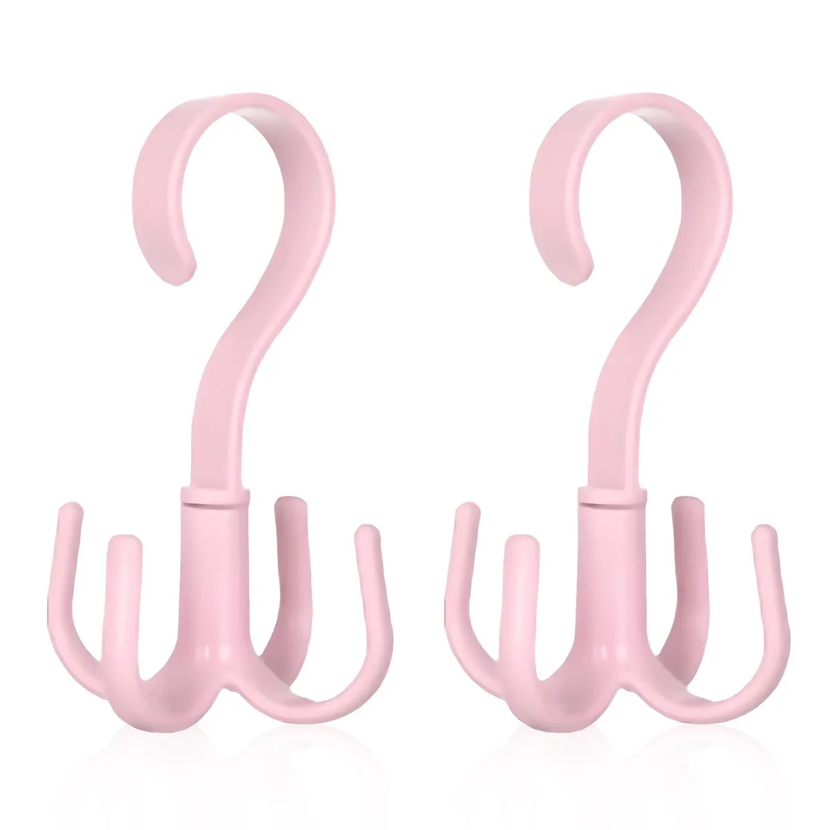 Two pink plastic rotating hangers each with four claws for belts and accessories