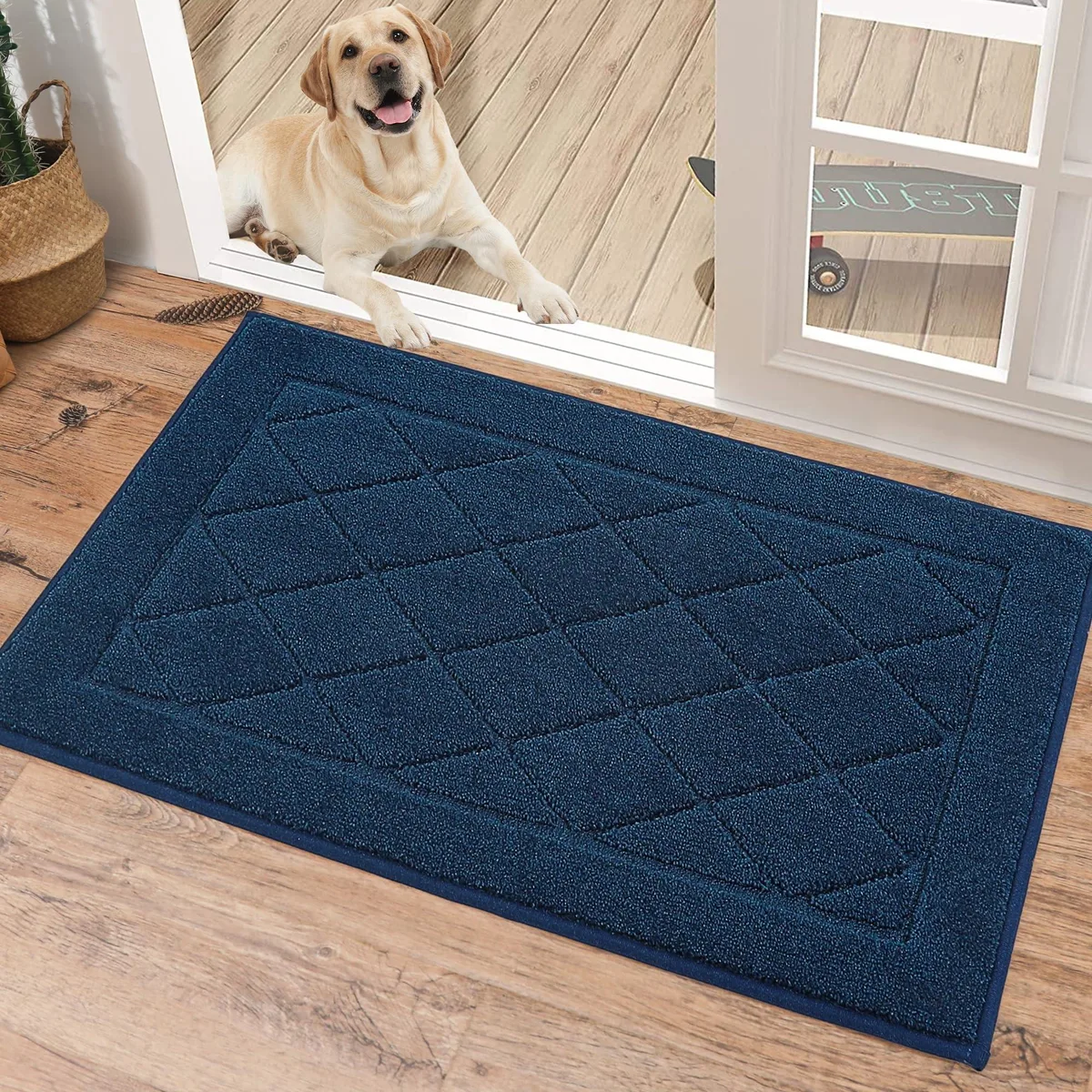 Navy blue rectangular door mat with geometric pattern, low profile, non-slip backing