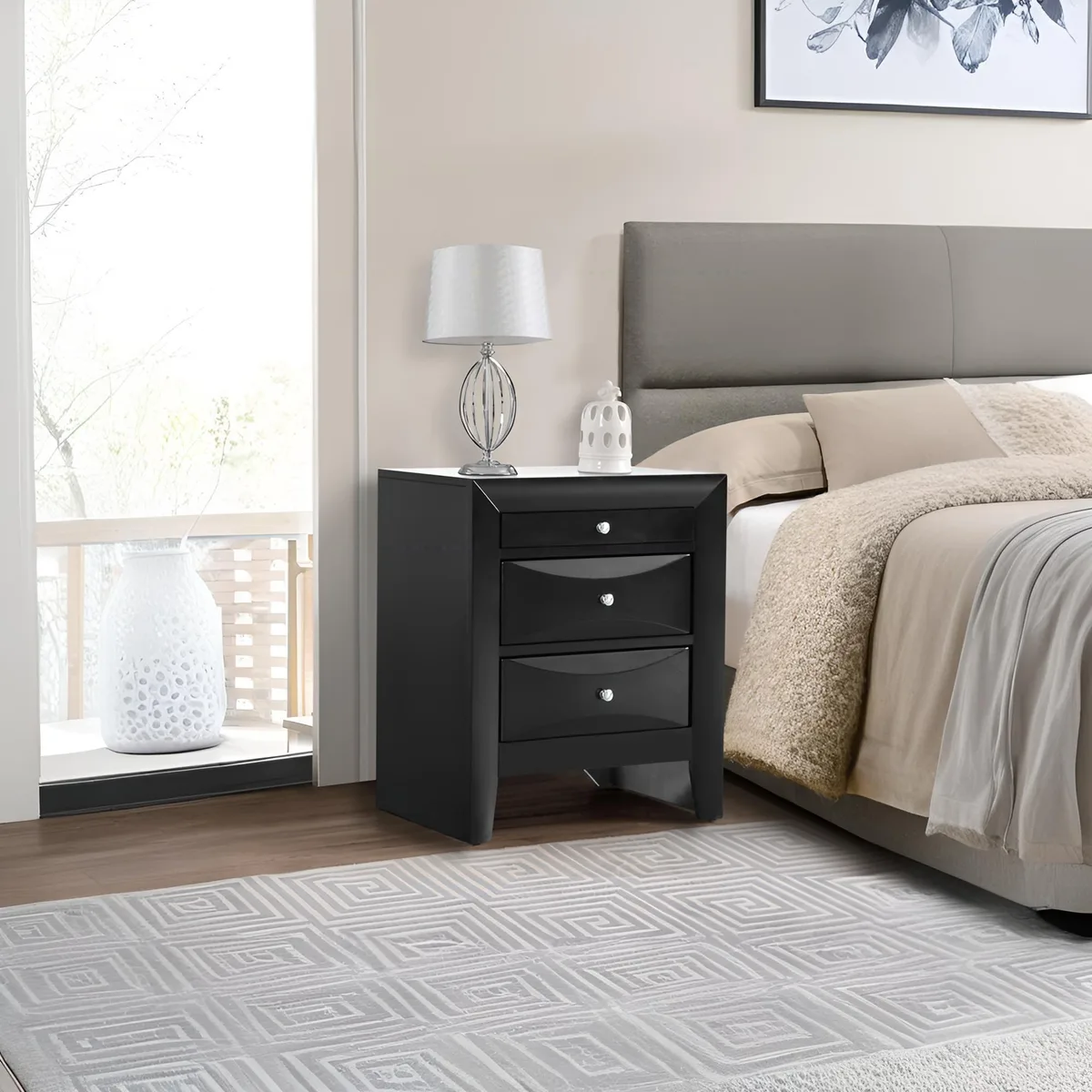 Black nightstand with three curved-front drawers, 28"H x 23"W x 17"D