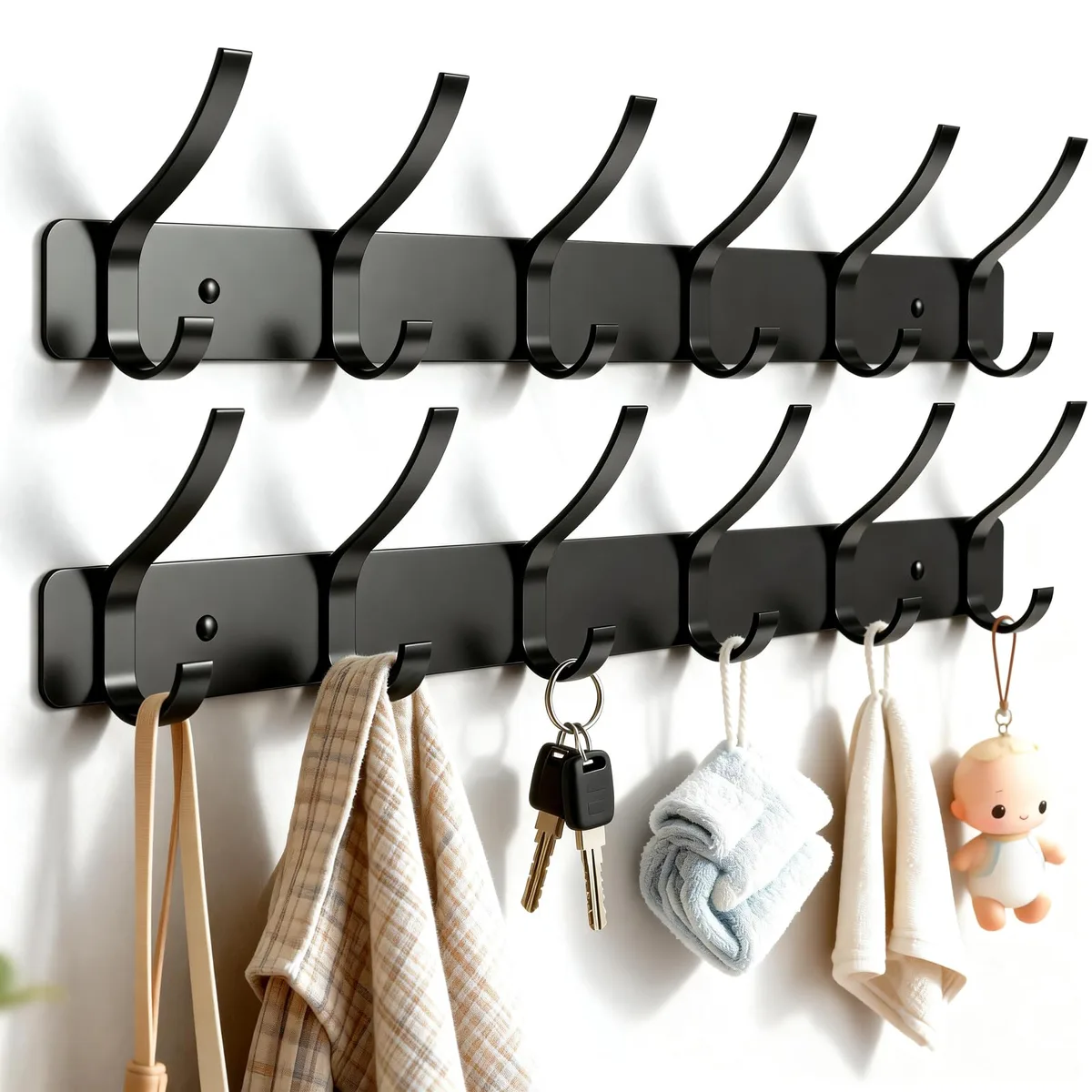 Two black aluminium coat racks, each with six rounded hooks, matte finish, wall-mounted design