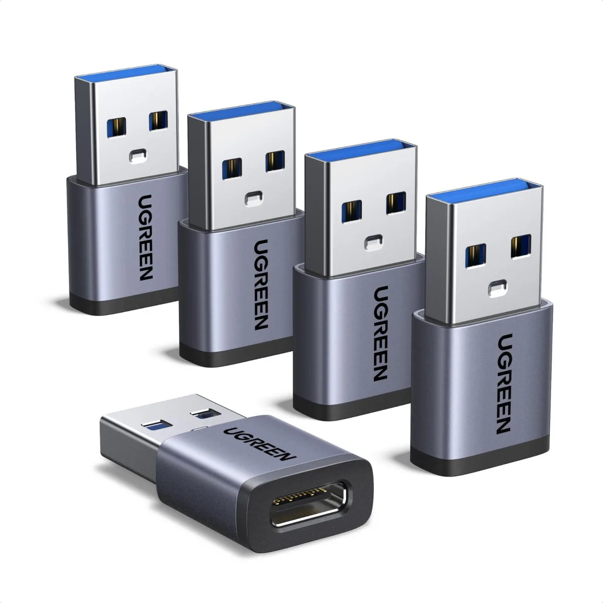 Five small silver USB-C to USB-A adapters in a row