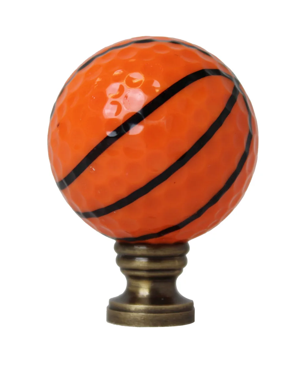 Orange basketball-shaped lamp finial with antiqued brass base, 2.25 inches tall