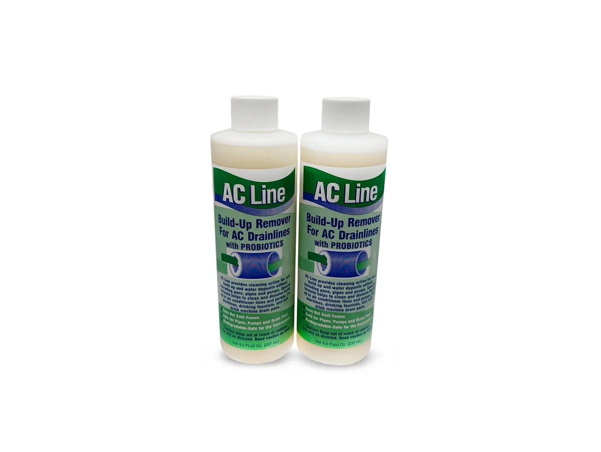 Two white plastic bottles of liquid line cleaner side by side