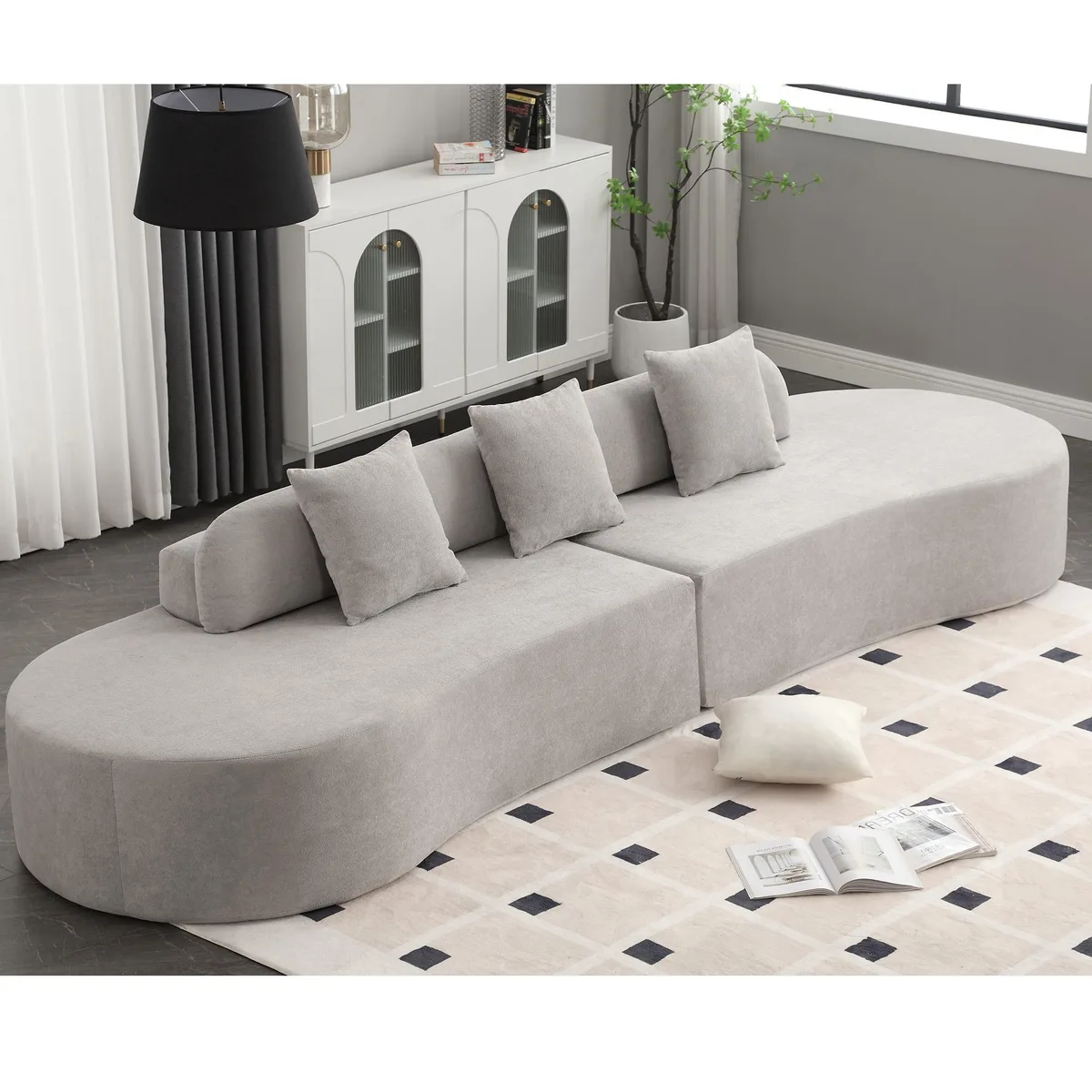 Modern curved combination sofa in gray terrycloth fabric with three pillows