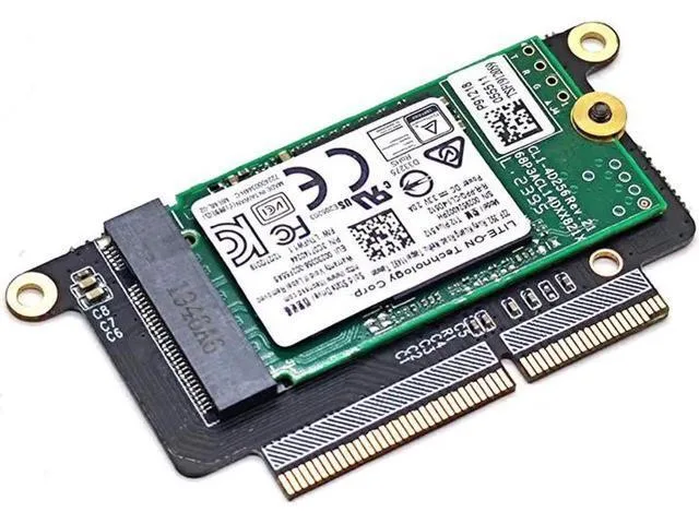 Small green circuit board with gold edge connector and M.2 slot