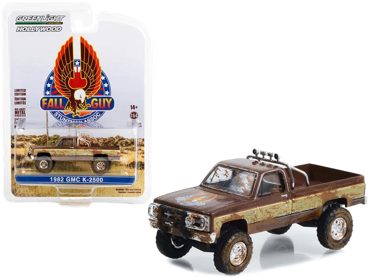 GREENLIGHT GREENLIGHT 1982 GMC K-2500 Sierra Grande Dirty Version Fall Guy 1/64 — product photo