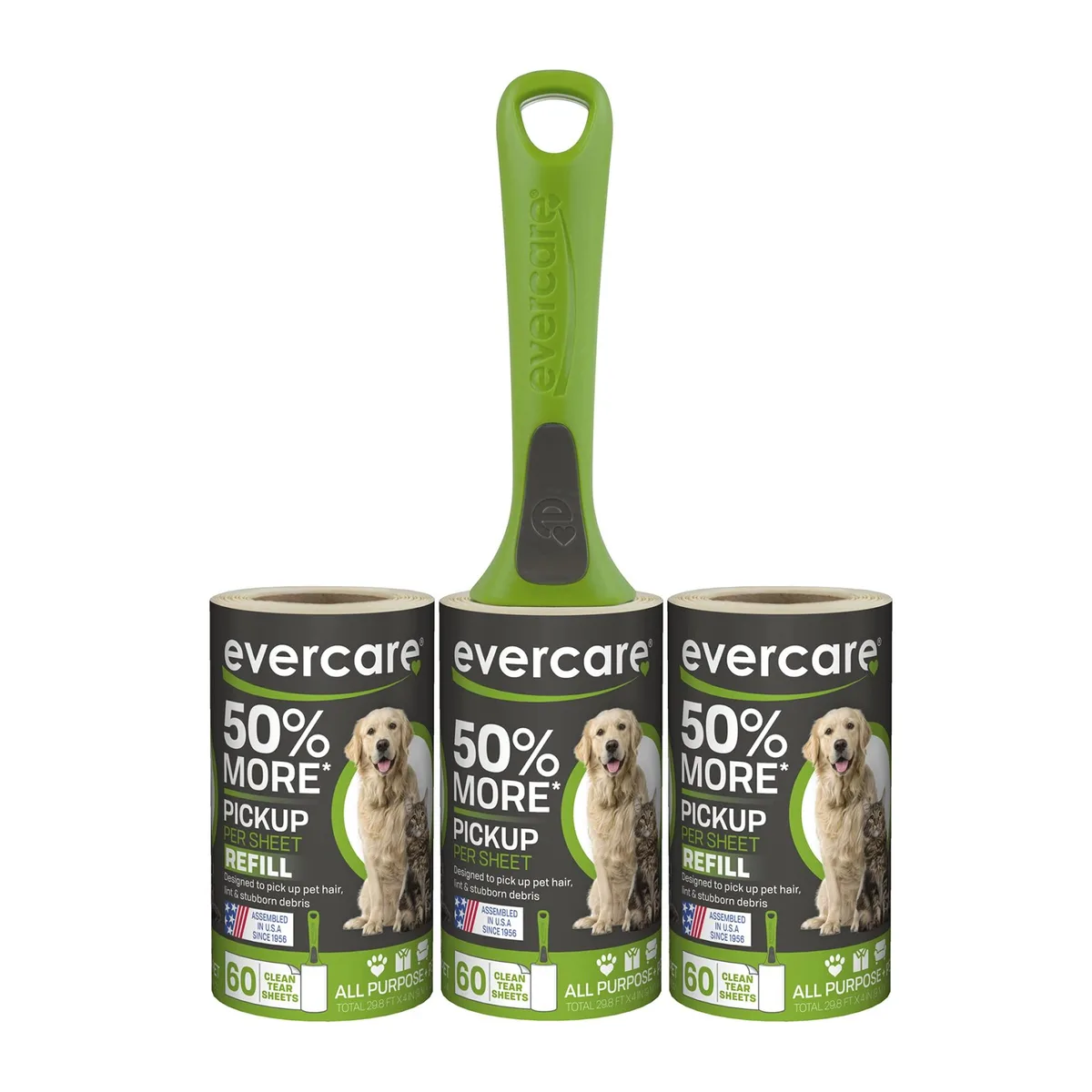 Green plastic lint roller handle with adhesive sheets and two refill rolls visible